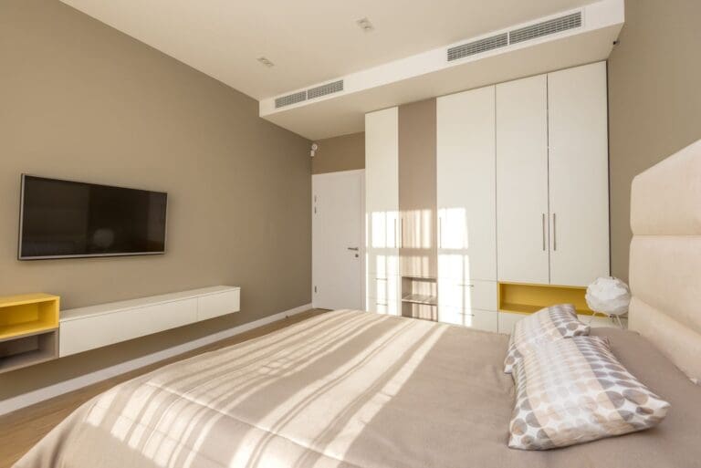 Bedroom Media Wall with Wardrobes and Built-In Storage: UK Design Guide